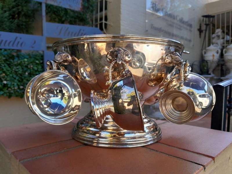A 20th Century A1 Silver-Plate Punch Bowl With Eight Cups And Hooks And Ladle With Elephant Head