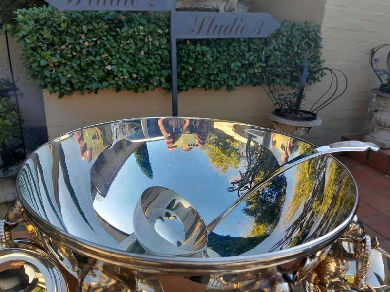 A 20th Century A1 Silver-Plate Punch Bowl With Eight Cups And Hooks And Ladle With Elephant Head