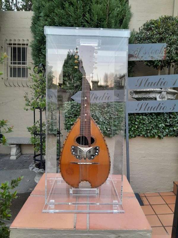 A 20TH Century Bouzouki in Perspex Display Box