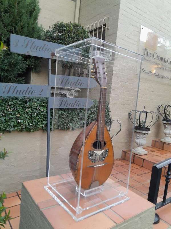 A 20TH Century Bouzouki in Perspex Display Box