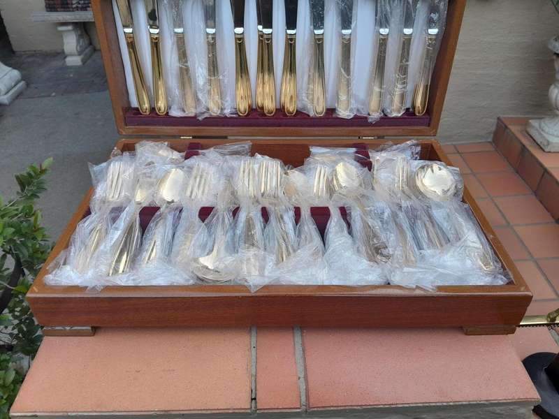 A Grawe And Hill Gold-Plated Cutlery Set With Maroon Lining In A Canteen