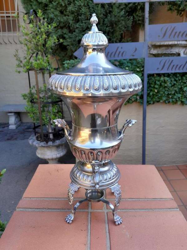 A 20th Century Silver Plate Hot Water Urn With Top On Lion Paw Feet