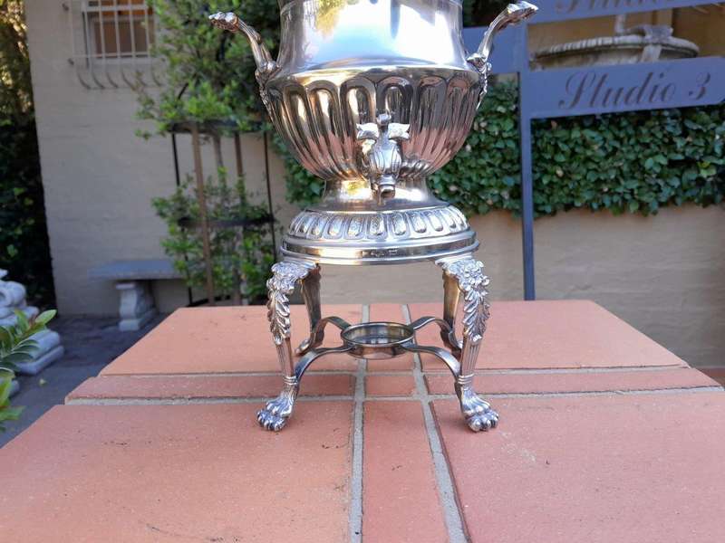 A 20th Century Silver Plate Hot Water Urn With Top On Lion Paw Feet