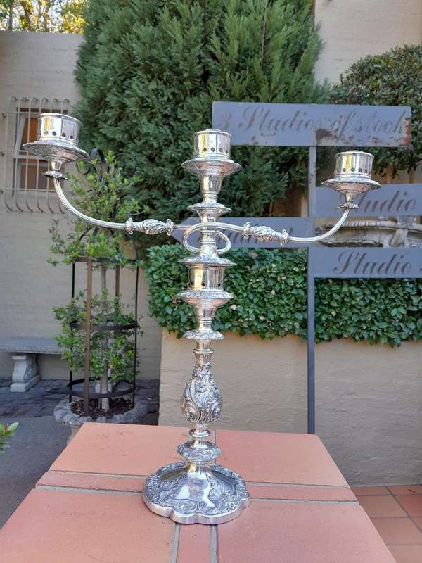 A 20th Century Pair Of Ornate Silver Plate Candelabras