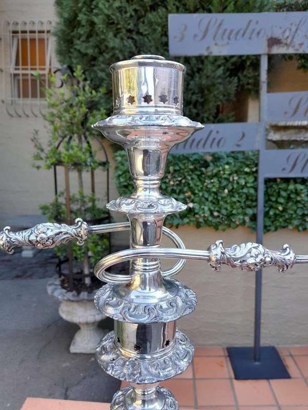 A 20th Century Pair Of Ornate Silver Plate Candelabras