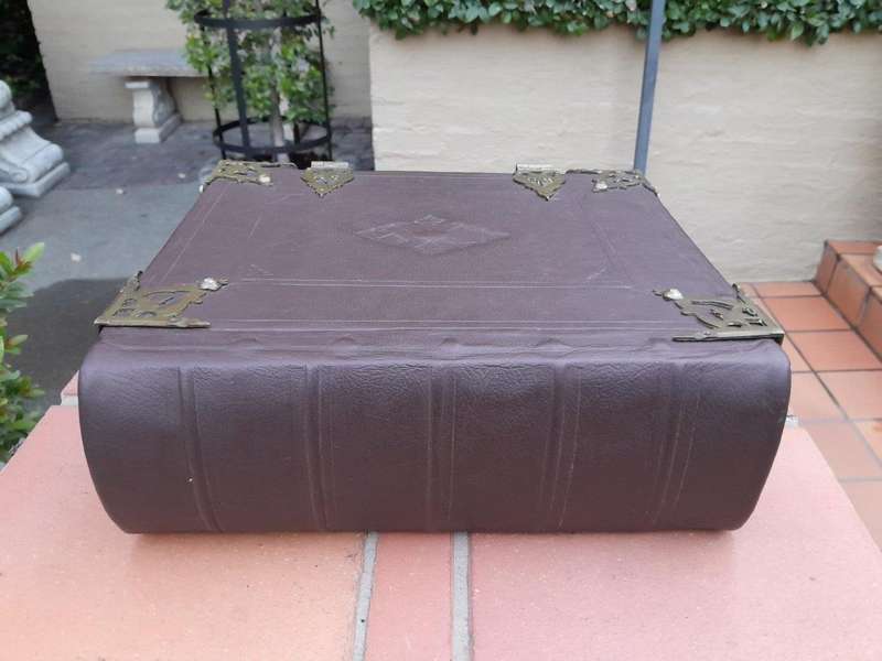 An Early 19th Century Large Leather Bound With Brass Clasps And Mounts Bible