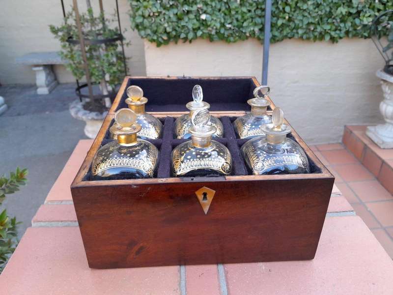 A 20th Century Decanter Velvet Lined Box With Six Decanters And Two Crystal Glasses