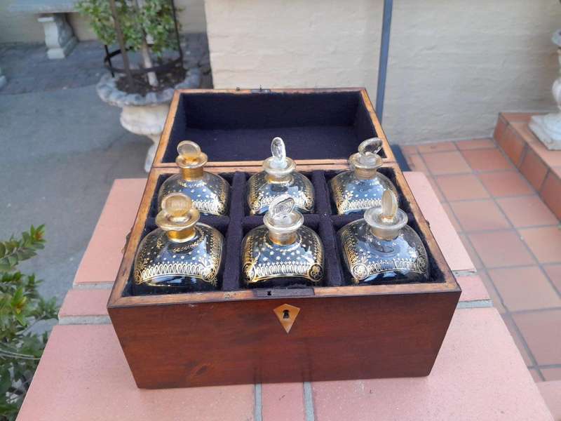 A 20th Century Decanter Velvet Lined Box With Six Decanters And Two Crystal Glasses