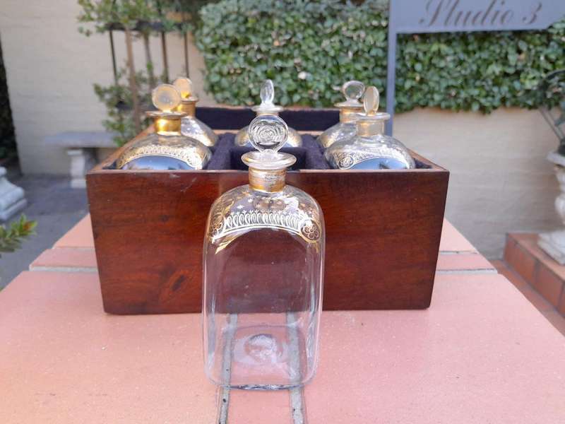 A 20th Century Decanter Velvet Lined Box With Six Decanters And Two Crystal Glasses