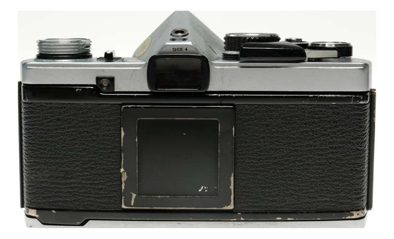 Olympus OM-2 camera body chrome with OM-System 35-105 zoom