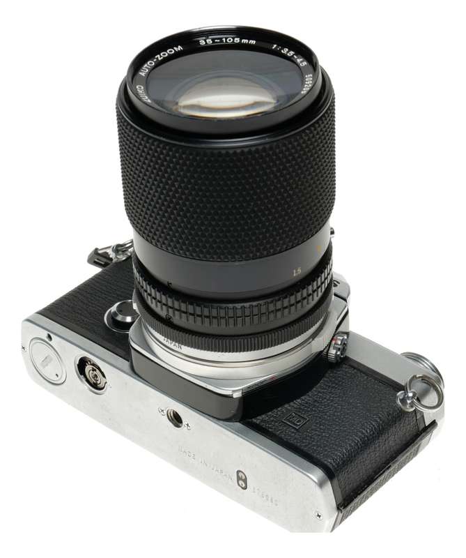 Olympus OM-2 camera body chrome with OM-System 35-105 zoom