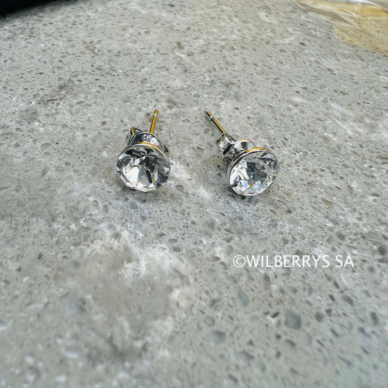 Retail: R1950.00 BRITISH JEWELLERS Solo White gold plated Earrings Made with Swarovski Elements®