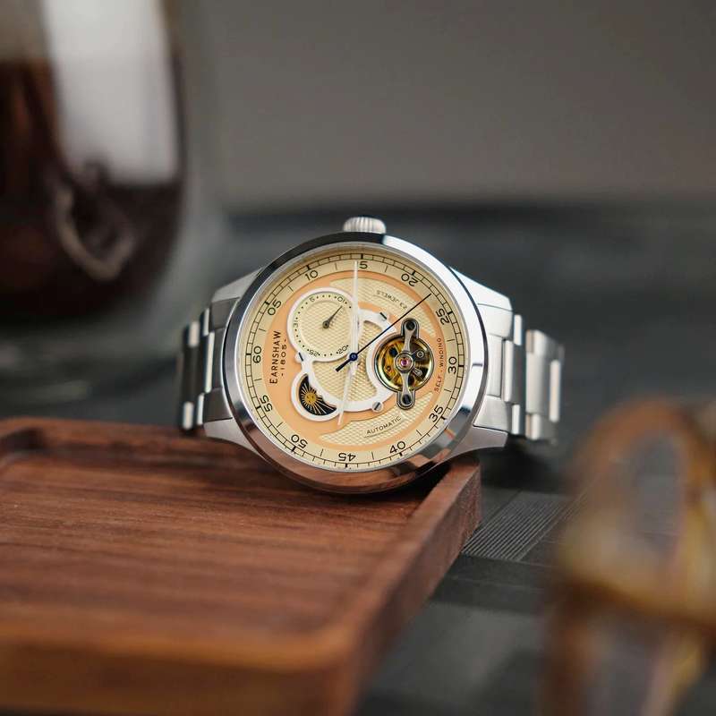 ***masterpiece*** rrp: R10,500.00 THOMAS EARNSHAW AUTOMATIC DAY/NIGHT OPEN HEART Rich Beige Watch