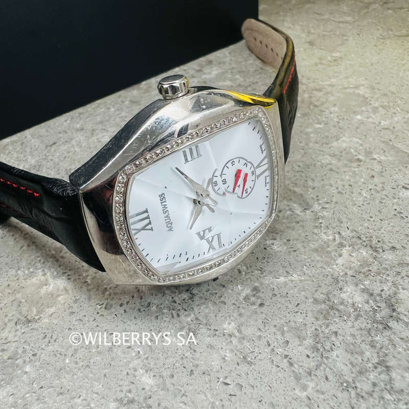 must see**rrp: R13,300.00 AQUASWISS Womens genuine diamond 0.65ctw Ice Pyramid Glass watch