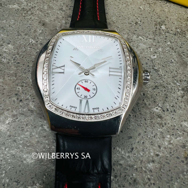 must see**rrp: R13,300.00 AQUASWISS Womens genuine diamond 0.65ctw Ice Pyramid Glass watch