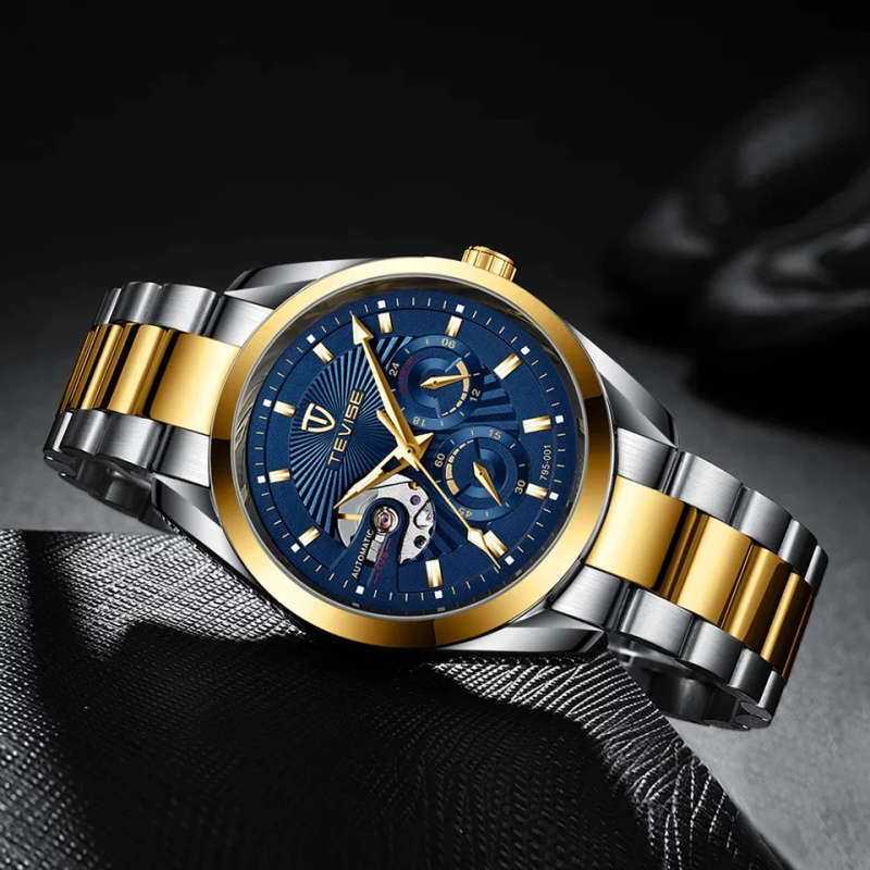 Retail: R2,399.00 TEVISE® Men`s Classic Automatic Partial Skeleton Two Tone/Blue Watch
