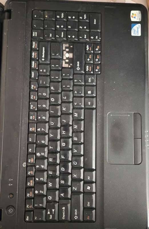 Two laptops for spares or to fix and a free cd writer also not working