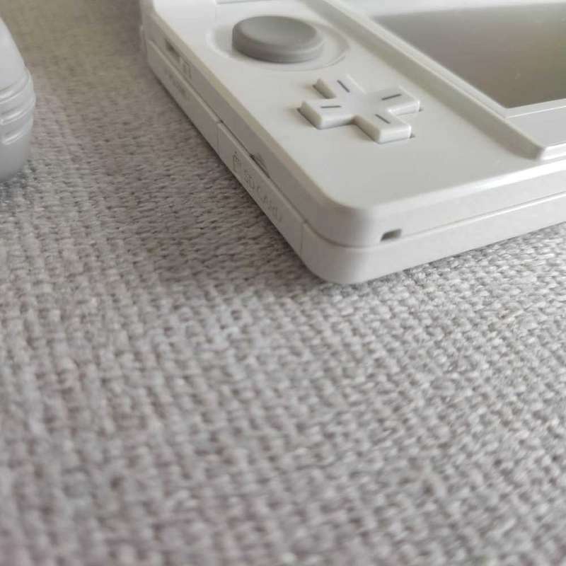Nintendo 3ds console with charger and stylus