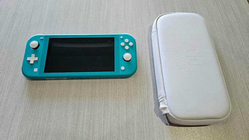 Nintendo Switch Lite -Turquoise + White carrying case &  pre-installed screen protector