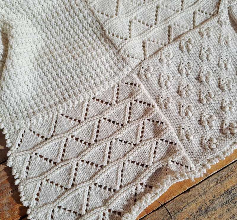Lovely knitted cot blanket 100 x 90cm