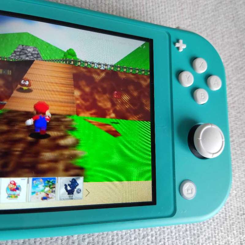 Nintendo Switch Lite Console +Original charger and Box