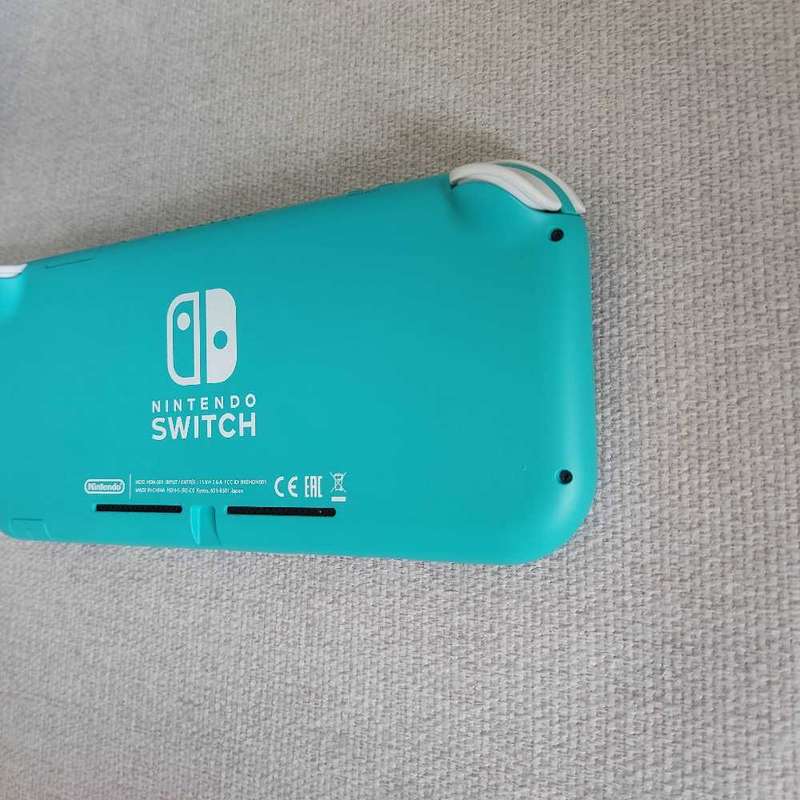 Nintendo Switch Lite Console +Original charger and Box
