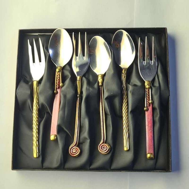 Special spoons. Brass and stainless steel.