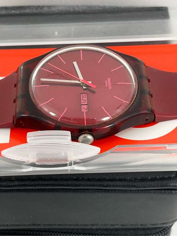 Swatch maroon watch