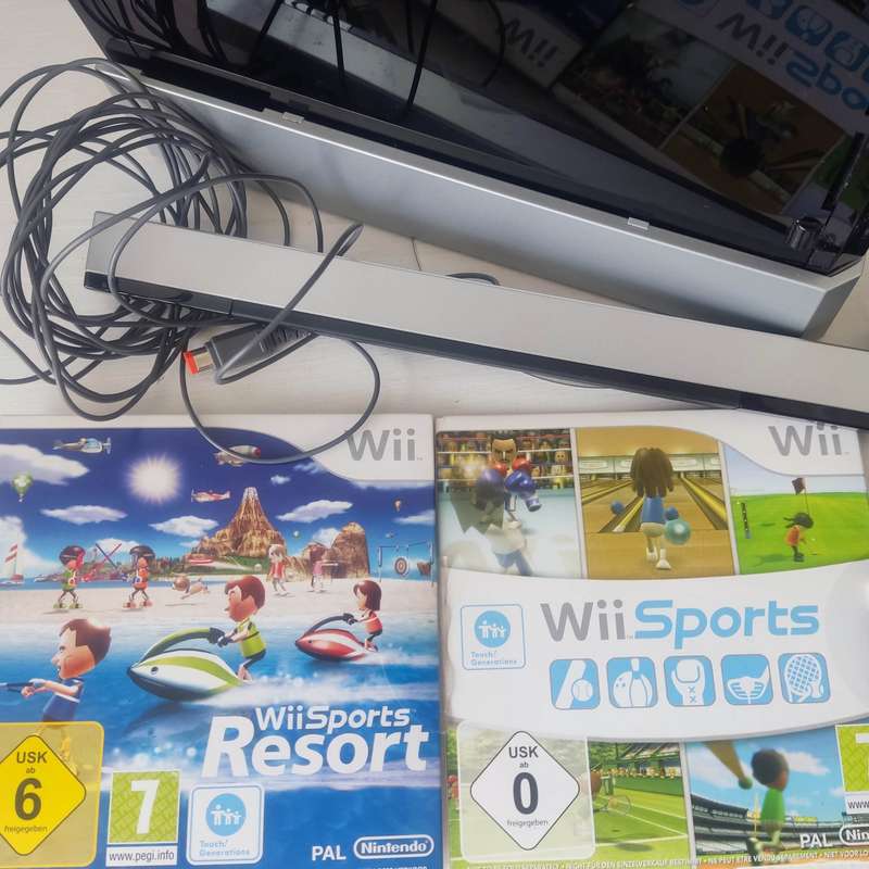 Nintendo Wii console with Wii Sports Resort and Wii Sports games bundle
