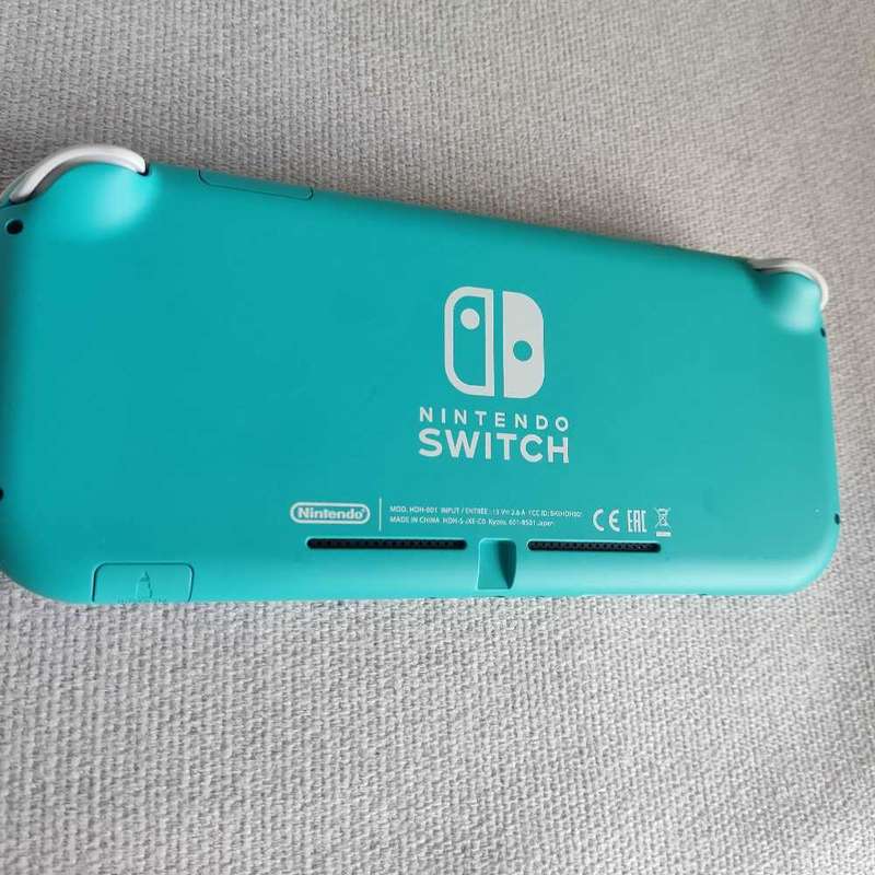 Nintendo Switch Lite Console +Original charger and Box