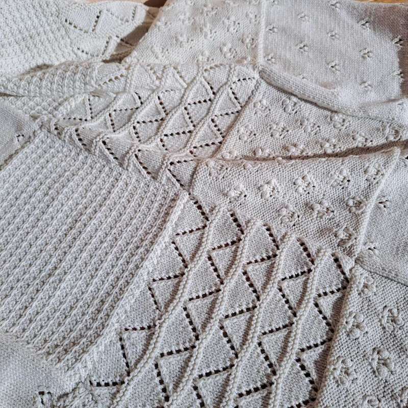 Lovely knitted cot blanket 100 x 90cm