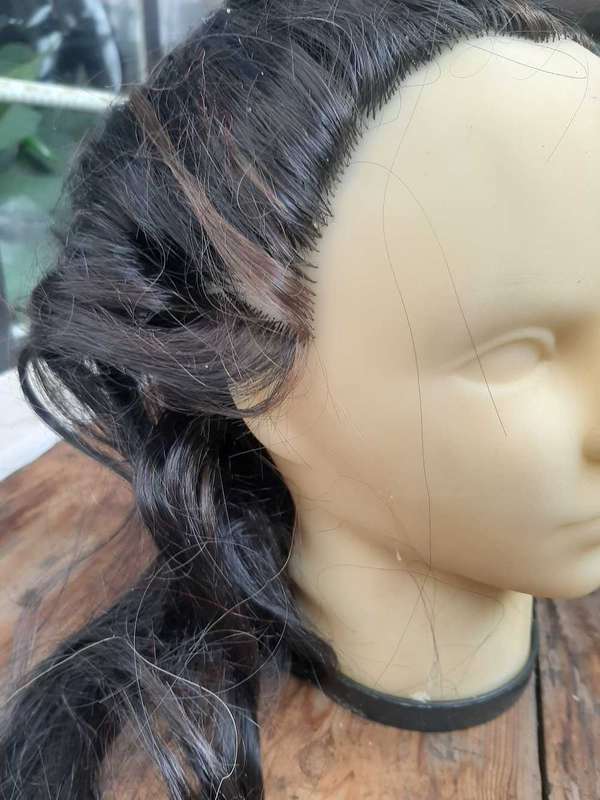 Display head mannequins with attached hair