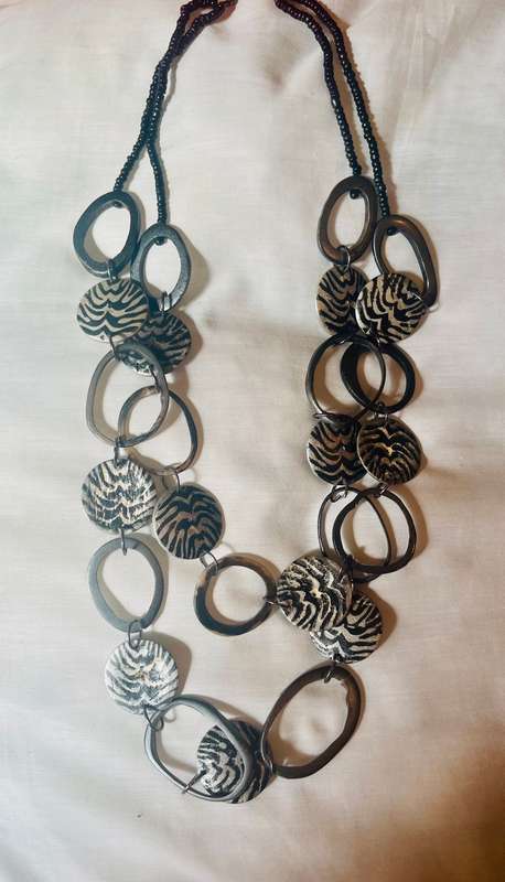 Necklace fashion jewellery zebra print discs .