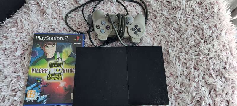 Playstation 2 with remote and game