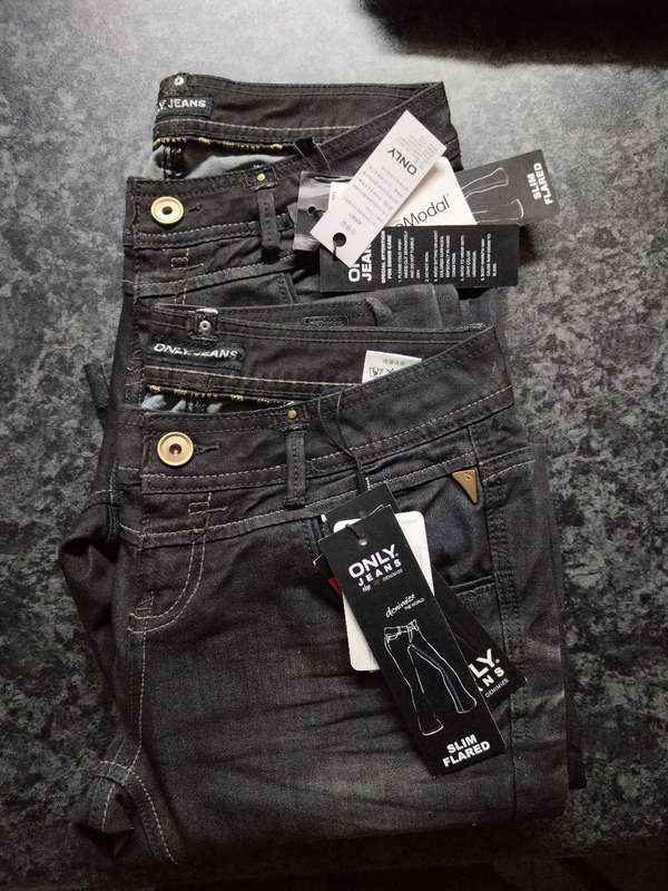 Various clothing and tech items