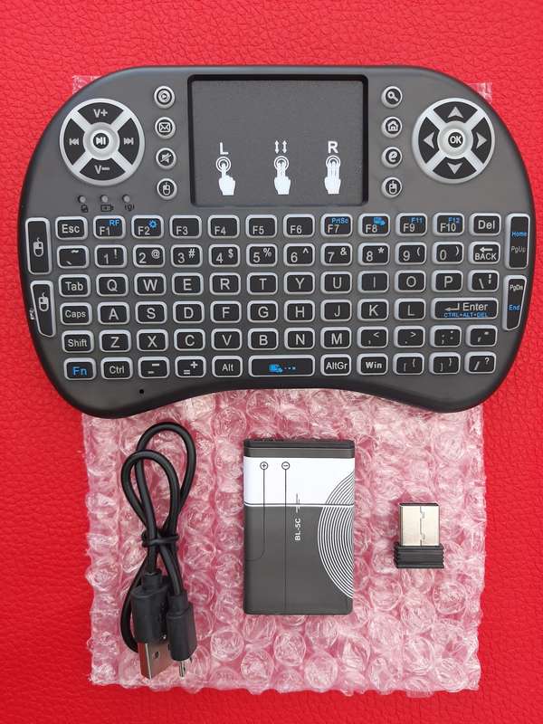 RGB Backlit Mini Wireless Keyboard with Built in Mouse Pad