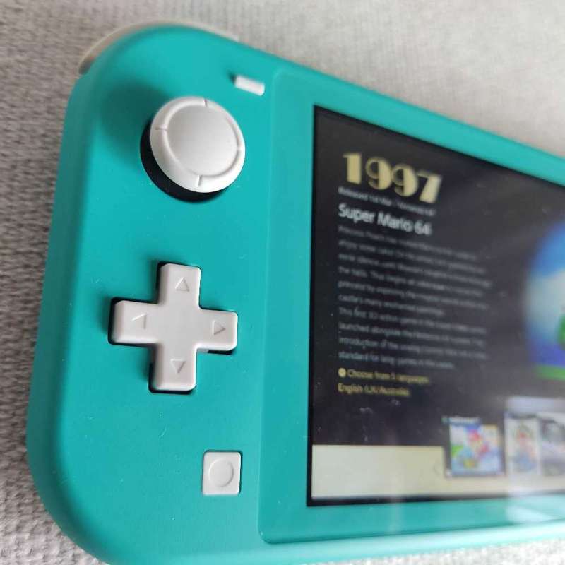 Nintendo Switch Lite Console +Original charger and Box