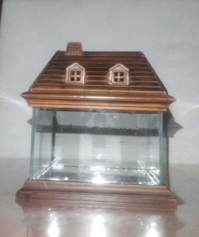 Vintage miniature glass house with mirror base