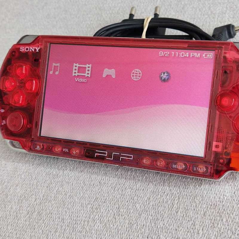 Sony psp console with memory card and charger