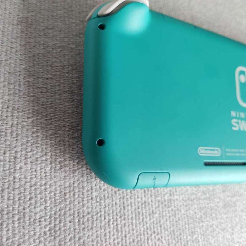 Nintendo Switch Lite Console +Original charger and Box