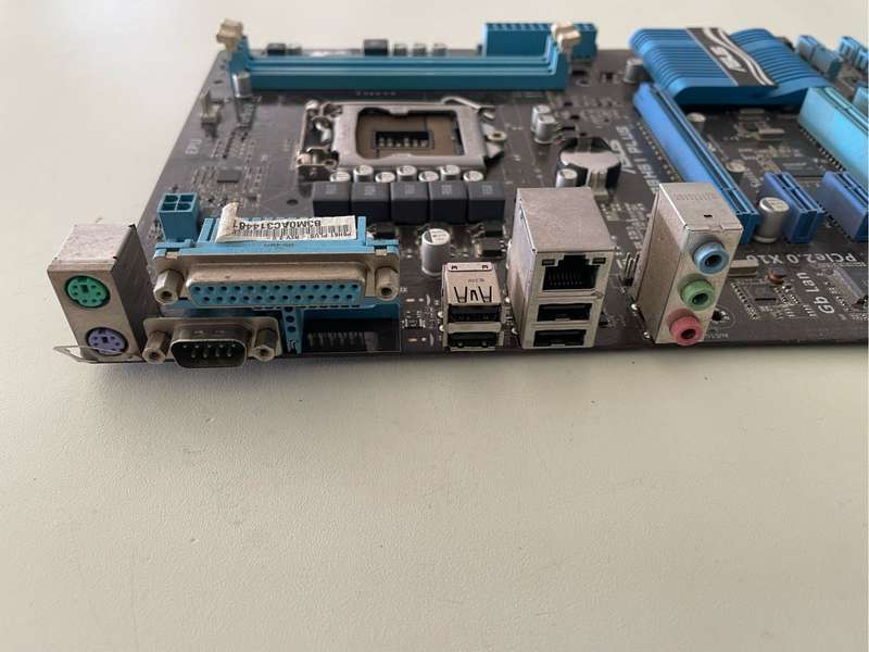 Asus P8H61 Plus Motherboard**For Parts Or repairs**
