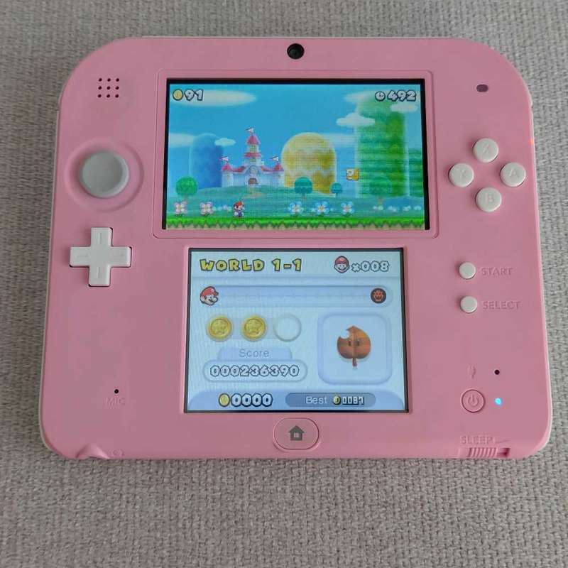 Nintendo 2ds console with original charger and stylus