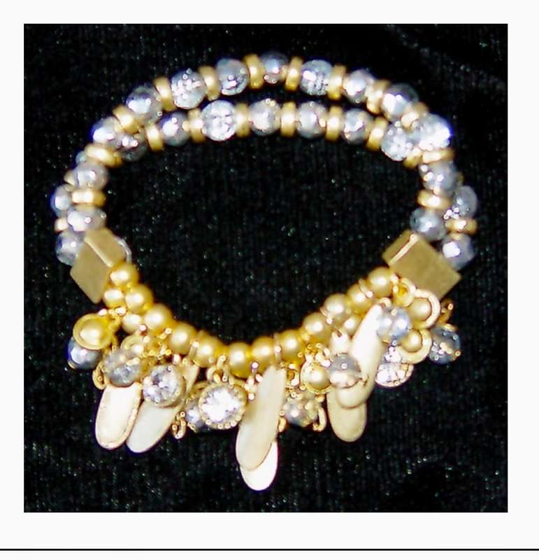 Bracelet , two row elastic . Crystal and diamante detail