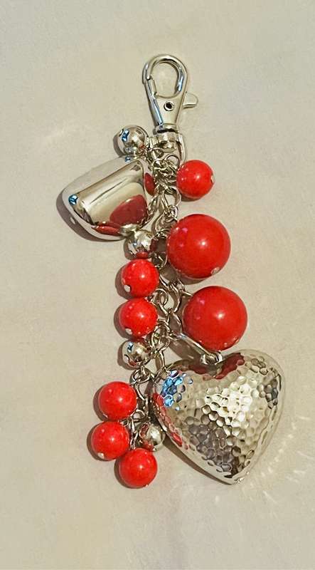 Bag charm silver and red bead detail