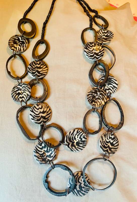 Necklace fashion jewellery zebra print discs .