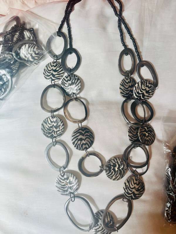 Necklace fashion jewellery zebra print discs .
