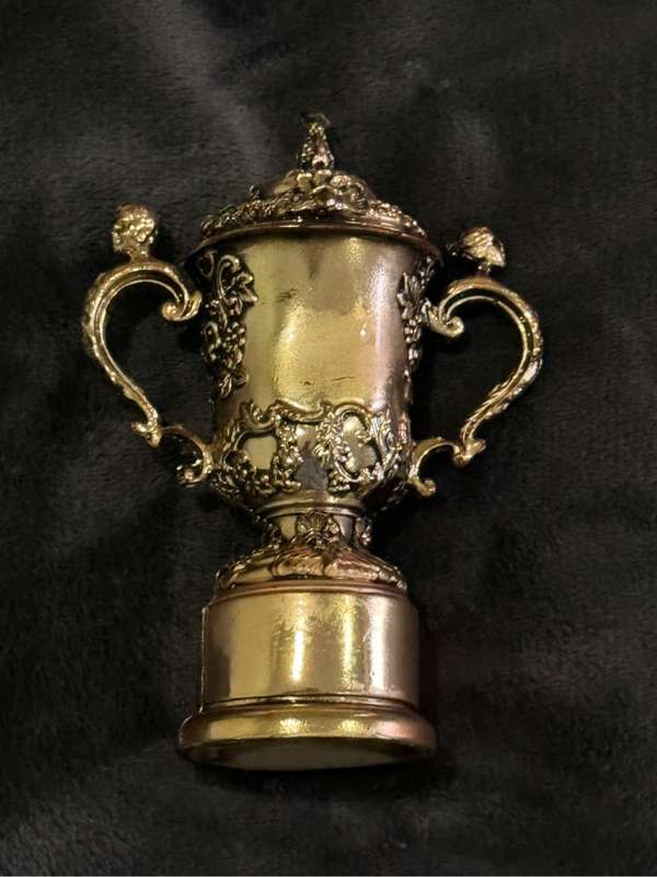 Miniature replica of the Rugby World Cup Webb Ellis Trophy