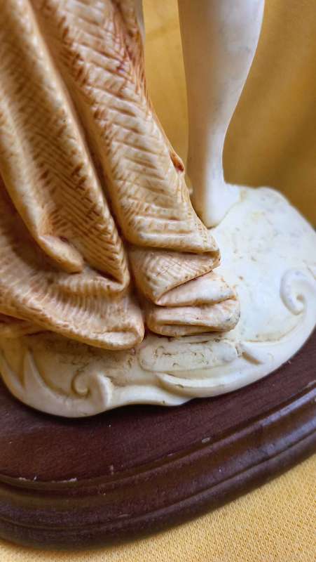 Vintage statue / sculpture of young girl holding a basket of fish - Simonelli  ?