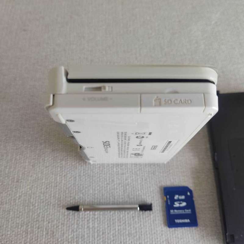 Nintendo 3ds console with charger and stylus