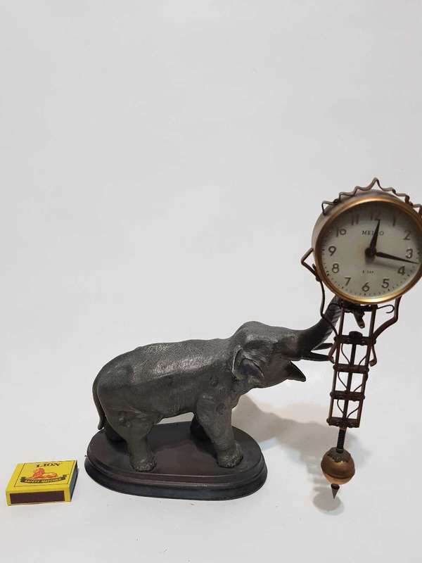 Elephant banjo clock